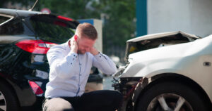 Young Male Driver Seeks Legal Aid After Car Injury