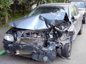 Severe front-end damage to car in Catawba County crash on I-40 West, fatal accident.